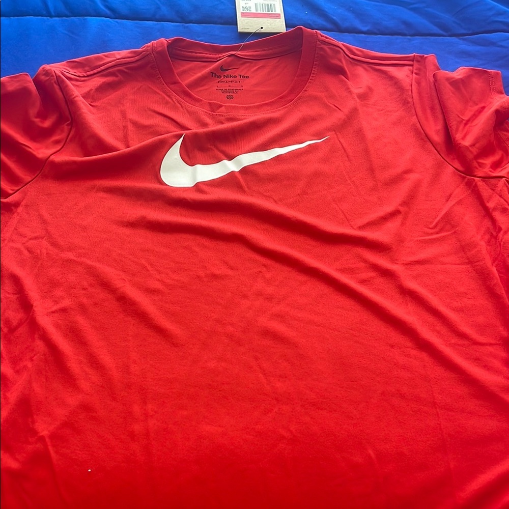 Nike Women’s red t shirt.
